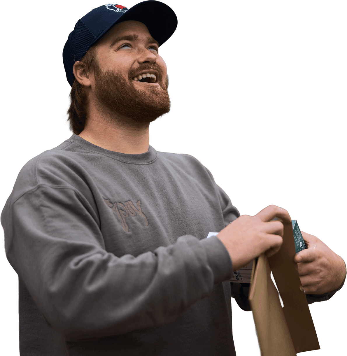 Walker Foreman smiling while holding a delivery bag.