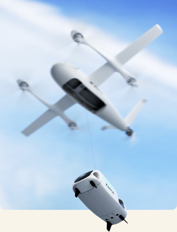 Zipline drone in flight lowering a delivery pod on a tether.