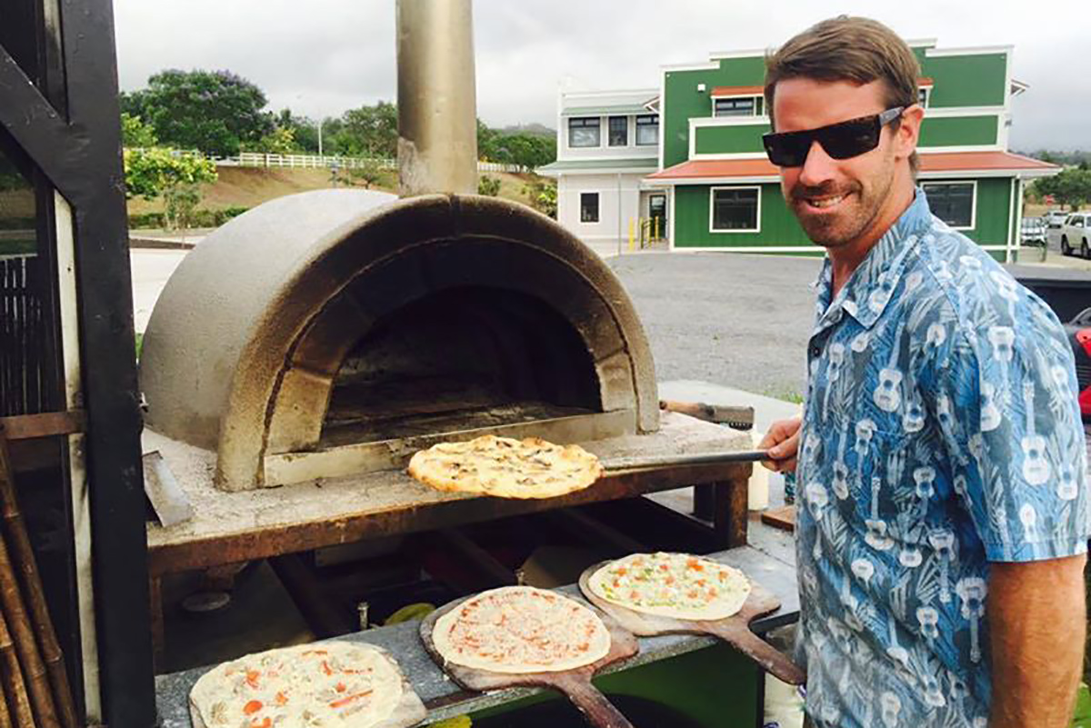 Maui's Outrigger Pizza Company's Food Truck cooking wood-fired pizzas.